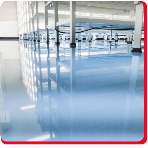 Flawless blue epoxy floor finish in a clean, high-tech facility in Aurora, Ontario.