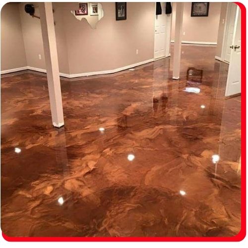 Metallic copper-toned epoxy flooring with a high-gloss finish in a Cambridge basement.