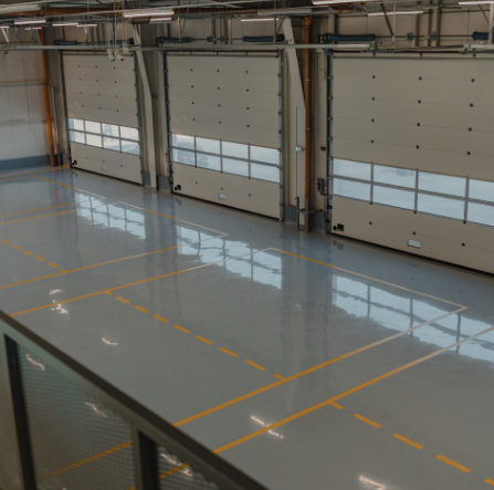 Wide view of a commercial epoxy-coated warehouse floor in Mississauga.