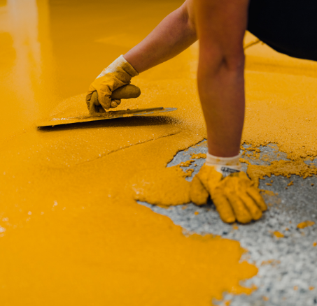 Epoxy mortar floor being trowel-applied in Richmond Hill for a seamless, industrial-grade finish.