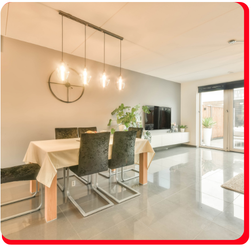 Bright dining room with modern furniture and a glossy residential epoxy floor finish.